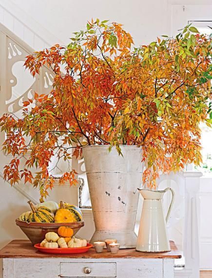 Borrow a scene from Mother Nature’s autumn show by filling vases with colorful leaves, cattails or sculptural branches. More fall decorating ideas: http://www.midwestliving.com/homes/seasonal-decorating/12-cozy-fall-decorating-ideas/?page=1 Autumn Decor Ideas, Filled Vases, Summer Leaves, Outdoors Indoors, Vibeke Design, Door Table, Midwest Living, Fall Arrangements, Autumn Decorating