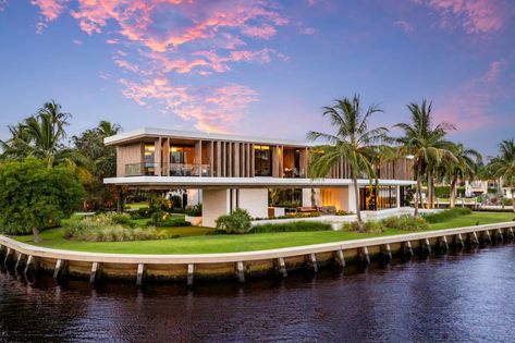 A modern waterfront mansion in Fort Lauderdale, Florida, hit the market in late August with a price tag just shy of $50 million, making it the second-priciest home for sale in the South Florida city.  Built with a cantilever design, the home appears to be floating above land. And with 740 feet of water frontage, this elevated design allows the home to capitalize on the surrounding views of the New River. Contemporary Mansion, Cantilever Design, Florida Mansion, Florida Homes For Sale, Destin Hotels, Florida City, Pickleball Court, Private Dock, Floating House