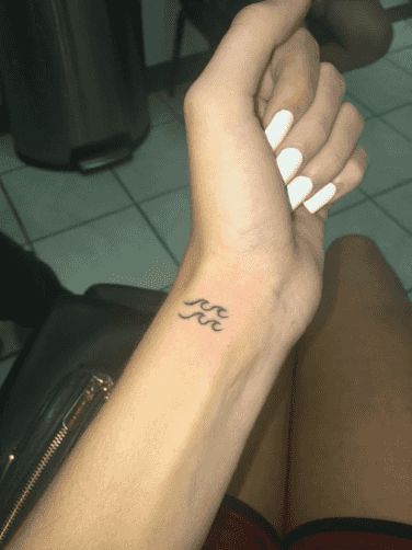 25 Best Aquarius Tattoo Ideas And Zodiac Sign Tattoos With Meanings | YourTango Aquarius Tattoo, Shape Tattoo, Zodiac Sign Tattoos, Zodiac Tattoos, Constellation Tattoos, Unique Tattoo Designs, Minimalist Tattoos, Subtle Tattoos, Pattern Tattoo