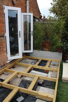 Kezzabeth.co.uk | UK Home Renovation, Interiors and DIY Blog Uk Decking Ideas, Diy Garden Renovation, Decking Ideas Garden Uk, Raised Decking Ideas Garden, Raised Decking Ideas, Raised Patio Ideas, Cabin Entrance, Tiered Patio, New Build Garden Ideas