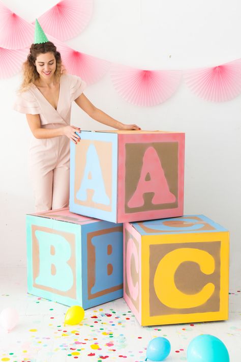 DIY Giant Baby Block Decorations Abc Party Decorations, Diy Letter Blocks For Party, Cardboard 1 Diy Birthday, Diy Blocks Decorations, Diy Baby Box Blocks, Baby Shower Props Diy, Diy Baby Blocks Decoration, Baby Blocks Baby Shower Diy, Diy Block Letters