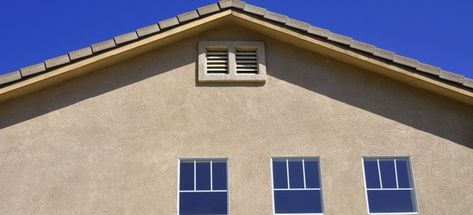 Pros and Cons of Stucco Homes | DoItYourself.com Home Exterior Windows, Home Exterior Stucco, New Home Exterior, Exterior Window Trim Ideas, Exterior Window Trim, Exterior Stucco, Window Trims, Rustic Home Exterior, Home Library Decor