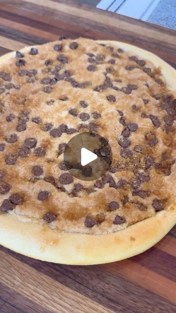 Luke Brown on Instagram: "Chocolate Chip Dessert Pizza🔥

INGREDIENTS 
1 pizza crust 
1 1/2 cups of yellow cake mix
1 stick of melted butter
1/2 cup of milk chocolate chips
1/4 cup sugar
1/4 cup brown sugar 

INSTRUCTIONS 
Press the pizza crust out onto a pizza pan. Poke holes with a fork all over pizza crust. Bake at 400 degrees for about 5 minutes. 

In a bowl, combine melted butter and the cake mix. In a separate bowl combine brown sugar and sugar. 

Take the pizza crust out of the oven and spread the cake mix/butter mixture all over the pizza crust. Add milk chocolate chips on top and gently press them into the pizza crust. 

Sprinkle the sugar mixture all over pizza (try to avoid the edges of the crust). I didn’t quite use all of the sugar mixture you can really use as much/as little Chocolate Chip Deserts, Chocolate Chip Dessert, Chocolate Chip Pizza, Chocolate Chip Cookie Pizza, 1960s Food, Pizza Puffs, Luke Brown, Desserts With Chocolate Chips, Deserts Easy