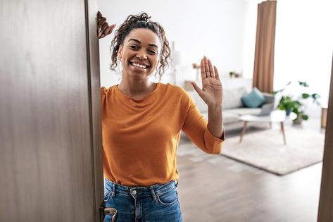 Photo joyful african american lady wavin... | Premium Photo #Freepik #photo #woman-home #hello #waving #hello-hand Turned Table Legs, Van Lines, Jeans Trend, First Home Buyer, Moving Long Distance, Buying Your First Home, Packers And Movers, Mortgage Payment, Moving Services