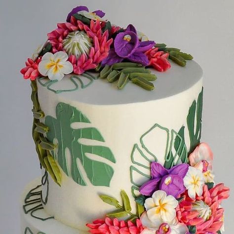 Kaly | Buttercream Flowers | Vintage Lambeth Cakes on Instagram: "Terrifically tall and tropical!  I've been a little quiet on here recently, but as summer draws to a close I figured it was time to take yet another @_leslie_vigil_ class. The theme: tropical flowers! 🌺 Makes me want to be in Hawaii real bad!  . . . #buttercreamflower #buttercreamcakes #buttercreamflowers #bostoncakedesigner #bostoncakes #bostoncake #bostonbakery #bosbakes #bostonfoodies #bostonwedding #customcakes #customcake #watertownma #tropicalcake #tropicalflowers #tropicalflower #tallcake #twotiercake #igcake #cakephoto #cakestyling #cakeinspiration #bostonsmallbusiness #prettycakes #summercake #cakeinspo #bakersspotlight #weddingcakeideas #islandvibe #kalyscakesandbakes" Tropical Theme Cake, Tropical Birthday Cake, Two Tier Cake, Cake Buttercream, Tall Cakes, Tropical Birthday, Summer Cakes, Cute Baking, Buttercream Flowers