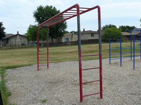 Monkey bars with gravel (and then blacktop) to fall to. We walked on top of it! And were always hanging up side down. Could only do that if we took shorts to school to wear under our dresses during recess. Vintage Playground Equipment, Modern Playground, School Playground Equipment, Monkey Bar, Community School, Of Challenge, Childhood Memories 70s, School Playground, Monkey Bars