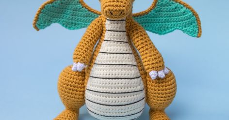 I made this pattern by changing up some of the (absolutely incredible) Charizard pattern by MiaHandcrafter . After I made the Charizard patt... Pokeball Crochet Pattern, Dragonite Pokemon, Pikachu Crochet, Turquoise Yarn, Pokemon Crochet Pattern, Crochet Pokemon, Pokemon Pattern, Crochet Dinosaur, Geek Crafts