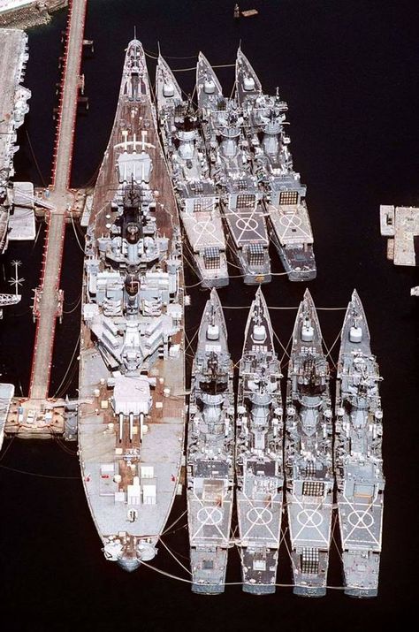 manfromjapan: “ An aerial stern view of the decommissioned battleship Iowa-class USS New Jersey (BB-62) and seven decommissioned Knox class frigates (and a carrier just peeking in off camera to the left) tied up at the Ship Intermediate Maintenance... Uss New Jersey, Us Battleships, Military Muscle, Capital Ship, Us Navy Ships, Naval History, Navy Marine, Us Marines, United States Navy