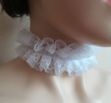 Ruffled lace collar, white lace ckoker.Handmade chic ruffled tulle collar. Organza ribbon ties  can be worn at the front or back of the neck detachable neck collar for women. approximate dimensions COLLAR:  wide 2" length 11- 12"  One size fits all.  adjustable with ribbon or please contact me for other sizes Please check your registered address on Etsy is up to date before purchasing  EXSPRESS SHİPPİNG:  need PHONE NUMBER Express shipping option available for countrys.You can see it when you buy and select your country We recommend you to send your phone number with a message in the fast cargo option. When the cargo does not find you on your adress. The product will not come back to me and it will be destroyed. The seller does not accept responsibility in this case The buyer is responsibl Tulle Collar, Clown Collar, Neck Ruffle Collar, White Lace Choker, Pierrot Clown, Lace Fingerless Gloves, Ruff Collar, White Chic, Lace Choker