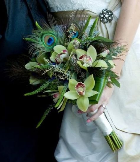 Dream bouquet! Yes please! Instead of green flowers, though, I definitely want orange ones! Hopefully orchids will be in season :) Peacock Wedding Decorations, Feather Bouquet, Peacock Wedding Theme, Orchid Bouquet, Great Gatsby Wedding, Peacock Wedding, Feather Wedding, Gatsby Wedding, Wedding Flower Decorations