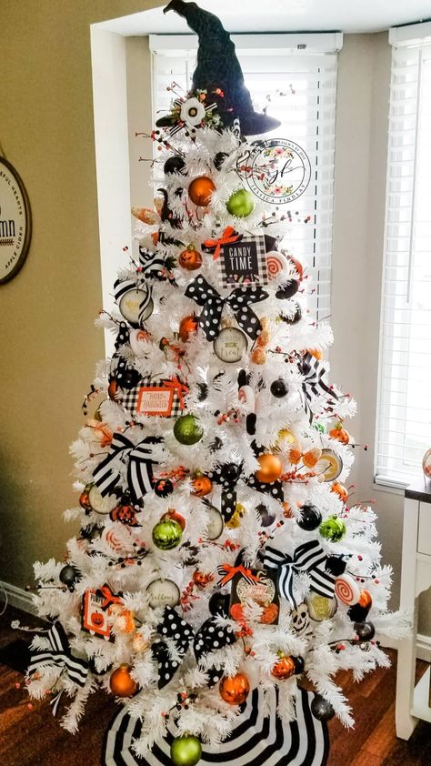 White Halloween tree with black and white stripes and polka dots. With candy corn and lollipops with orange and green colors. Handmade ornaments with chalk couture. Follow for more inspiration and diy tutorials. Christmas Tree Year Round, Holiday Tree Ideas, Christmas Tree Decor Ideas 2023, Unique Christmas Trees Themes, Patriotic Christmas Tree, Unusual Christmas Trees, Halloween Tree Decorations, White Artificial Christmas Tree, Halloween Christmas Tree