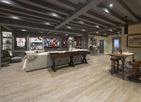 Sports Den | Basement Ideas (Photo: Bob Narod Photography; Design: Metro Building and Remodeling) #finishedbasementideas Transitional Basement, Industrial Basement, Tv Rooms, Dark Basement, Dream Basement, Cozy Basement, Diy Basement, Building Remodeling, Basement Makeover