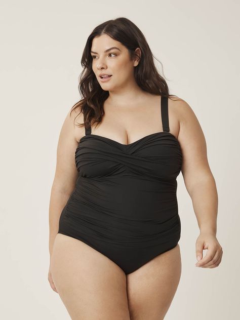 ONLINE EXCLUSIVE. Wherever you go this summer, this plus-size bandeau-cut one-piece swimsuit from Anne Cole will make you feel beautiful. Shirred sides and a twisted front give you a touch of elegance, while removable straps and built-in cups provide maximum support.   Features - One-piece design - Solid black - Strapless cut - Twisted front - Shirred side - Detachable straps