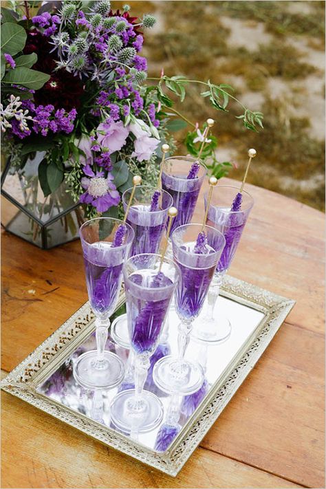 rock candy wedding drinksIngredients 1 1/2 oz. hpnotiq harmonie 1/2 oz. gin 1/2 oz. lemon juice extra dry champagne purple rock candy Deco Violet, Lila Party, Glam Ideas, Wedding Signature Drinks, Bridal Garters, Violet Wedding, Wine Party, Purple Party, Fancy Drinks