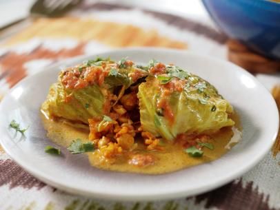 Stuffed Cabbage with Curry Coconut Milk and Chickpeas Recipe | Alex Guarnaschelli | Food Network Curry Coconut Milk, Get Stuffed, Alex Guarnaschelli, Curry Coconut, Chickpeas Recipe, Stuffed Cabbage, Coconut Milk Recipes, How To Peel Tomatoes, Coconut Milk Curry