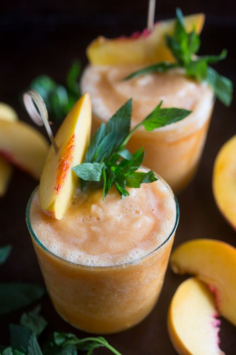 These peach tea bourbon slushies are the perfect summer addition. Full of peach tea, bourbon and lots of fresh peaches. This cocktail is summer perfection! from @nutmegnanny Bourbon Slushies, Bourbon Slush, Peach Bourbon, Maki Sushi, Easy Sushi, Fresh Peaches, Peach Tea, Mixed Drinks Recipes, Frozen Drinks