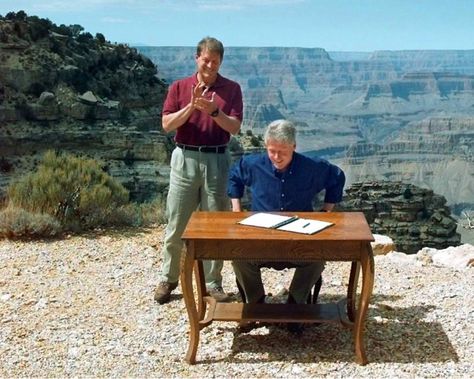 FILE - In this Sept. 18, 1996, file photo, Vice President Al Gore applauds after President Bill Clinton signs a bill designating about 1.7 million acres of land in southern Utah Al Gore, Grand Staircase Escalante, Escalante National Monument, Tour Around The World, Bill Clinton, Grand Staircase, National Monuments, Barack Obama, Utah