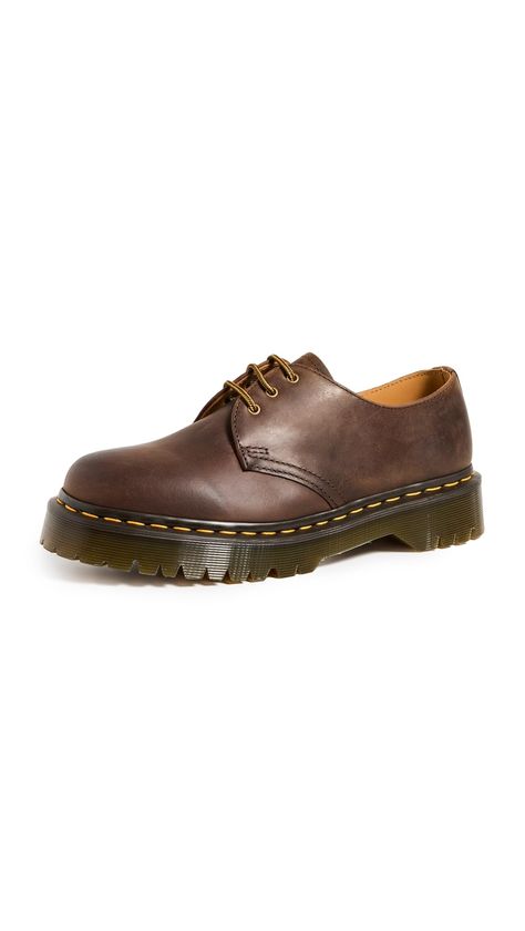 PRICES MAY VARY. The solid style of the Dr. Martens 1461 Bex shoe lets you dress them up or dress them down to match your everyday style. Crazy Horse is a heavyweight leather with a tough, textured appearance — designed to look worn in from the first step Includes classic Doc's DNA like yellow welt stitching, three eyelets, and a grooved air-cushioned sole. Traditional lace-up closure with sturdy fabric laces and metal eyelets for a secure fit. Goodyear welt construction where the upper and sole Doc Marten Bex Oxford Outfit, Doc Marten Crazy Horse, Crazy Horse Doc Martens Outfit, Brown Doc Martens Outfit, Brown Docs, Maroon Doc Martens, Dr Martens Bex, Doc Martens Oxfords, Brown Doc Martens