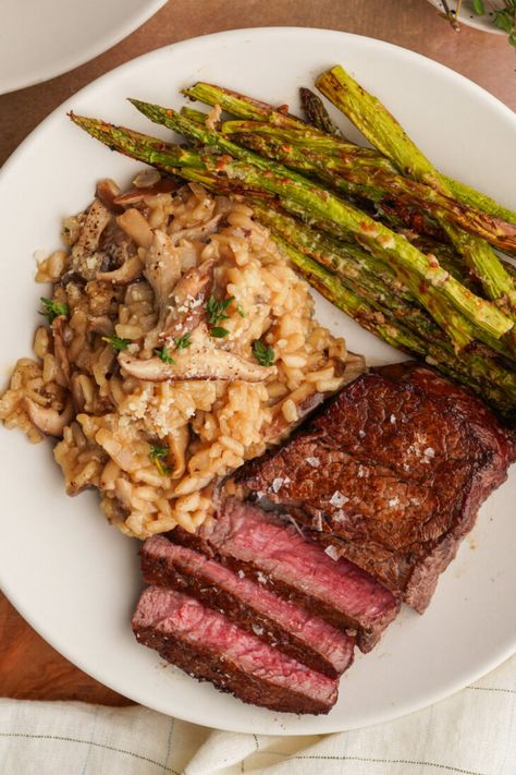 This Wild Mushroom Truffle Risotto is a creamy and delicious dish that can be a meal on its own or make an amazing side. Sautéed mushrooms and a drizzle of truffle oil add incredible flavor this classic risotto recipe. Reverse Sear Filet Mignon, Cast Iron Chicken Thighs, Pan Fried Chicken Thighs, Mushroom Truffle, Truffle Risotto, Antipasto Salad Recipe, Keto Chicken Thigh Recipes, Cast Iron Chicken, Mignon Steak