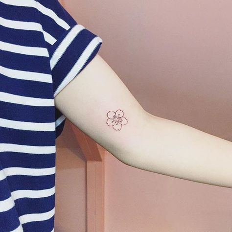 Cherry blossom tattoo by Ida. #linework #miniature #flower #cherryblossom #tiny… Japanese Tattoo Women, Minimalist Tattoo Meaning, Sakura Tattoo, Flores Tattoo, Japanese Tattoo Symbols, Typography Tattoo, Muster Tattoos, Delicate Tattoo, Japanese Tattoos