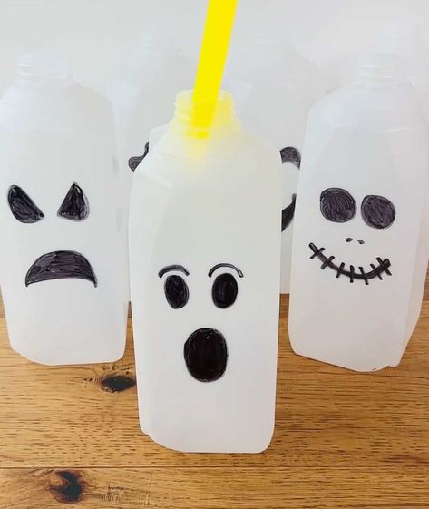 How to Make Spooktacular Milk Jug Jack-O-Lanterns Milk Jug Jack-o'-lanterns, Milk Jug Halloween, Milk Jug Ghosts, Halloween Milk Jugs, Milk Jug Crafts, Construction Paper Crafts, Halloween Wood Crafts, Upcycled Projects, Toddler Arts And Crafts