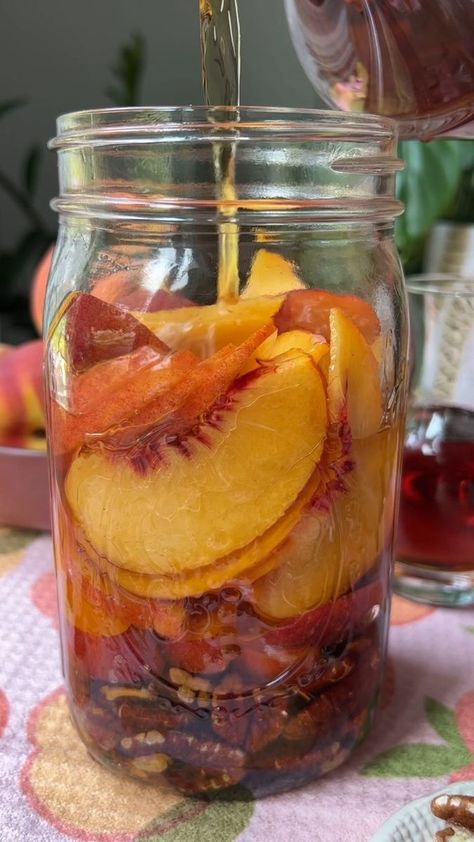 Peach Pecan Infused Bourbon 🍑🥃 We’ve been infusing different types of alcohol all summer long and to my surprise, this has been one of my absolute favorites! It’s a little sweet, perfectly peachy and slightly nutty, which adds so much depth of flavor to any summer cocktail. We added ours to iced tea with some homemade peach syrup and it was perfection! It’s also incredible in a peach bourbon smash, or even just for sipping on its own. Infusing is such a great way to capture the flavor of your Infused Bourbon, Peach Pecan Whiskey Drinks, Infused Bourbon Recipes, Bourbon Soaked Peaches, Peach Pecan Infused Bourbon, Peach Bourbon, Infused Alcohol Recipes, Peach Infused Bourbon, Peach Moonshine Recipe Everclear