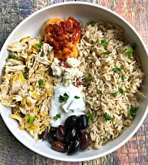 Instant Pot Mediterranean Greek Shredded Chicken and Brown Rice Bowl is a quick and easy pressure cooker recipe perfect for meal prep and weeknight dinners! This bowl includes fresh red pepper hummus, tzatziki sauce, and kalamata olives. The chicken breasts are seasoned with turmeric, thyme, and paprika. #InstantPot #InstantPotRecipes Mediterranean Instant Pot, Easy Pressure Cooker Recipes, Mediterranean Diet Recipes Dinners, Pot Recipes Healthy, Med Diet, Chicken And Brown Rice, Easy Mediterranean Diet, Greek Lemon Chicken, Mind Diet