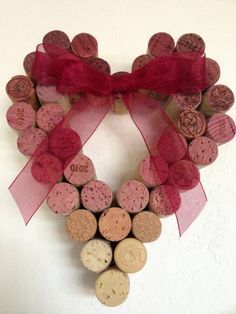 Valentine's Day is quickly approaching—so we've rounded up 20 of our favorite DIY Valentine's Day wreath ideas that everyone is sure to love. Diy Wreath Ideas, Diy Valentines Day Wreath, Wine Cork Diy Crafts, Cork Wreath, Cork Crafts Diy, Wine Cork Diy, Crown Ideas, Wine Cork Art, Cork Projects