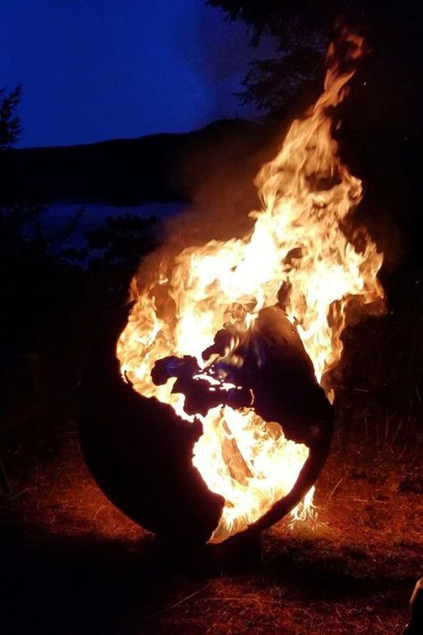 This stunning handcrafted fire pit globe depicts the continents of planet Earth engulfed in flames when lit from within. The Continents, Watch The World Burn, In Flames, Earth Art, Planet Earth, Collage Art, Fire Pit, Planets, Outdoor Living