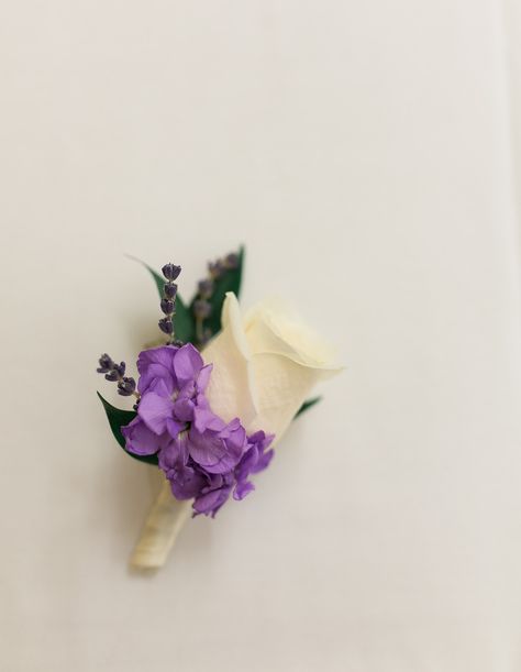 Simple white rose boutonniere with purple flower accent. Laramie, WY Winter Wedding by Megan Lee Photography | Wyoming based Photographer Wedding Flowers Purple, Boutonniere White, Purple Boutonniere, Megan Lee, White Rose Boutonniere, Winter Wedding Planning, Wyoming Weddings, White Boutonniere, Beach Wedding Centerpieces