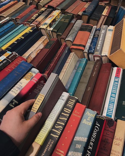 hand picking up a book in a book stack Book Fair Aesthetic, Downtown Boy, Fair Aesthetic, Custom Bookshelves, Book Haul, Crystal Aesthetic, Academia Fashion, Boy Aesthetic, Book Fair