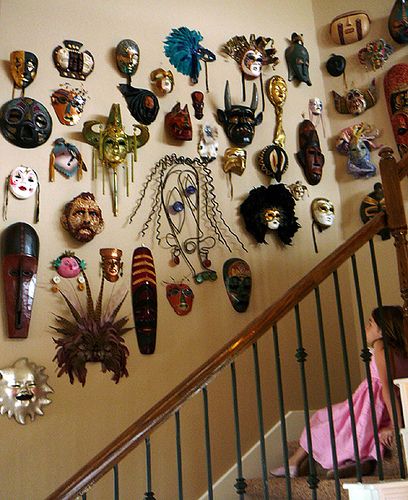 Collection of masks from world folklore- part Jungian/Campbell, part Freudian psychoanalytic, all syncretic. I have a few already, but would love more for my future place. Scary Staircase, Masks On Wall, Wall Of Masks, African Inspired Decor, Mask Collection, Mask Wall, Wall Mask, African Decor, Art Africain