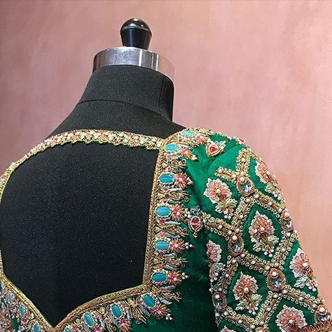 BlouseHousebyMahithaPrasad on Instagram: "Get ready for your queen-like regal look with Heavy Doses of Handcraft in this magnificent, made-to-order Dark Green Raw Silk Blouse from Blouse House by Mahitha Prasad. This royal piece dazzles with jewelled Buttas scattered all across its body, enhanced by distinctive sleeve embroidery. The intricate Jewelled Embroidery on the Neckline and Sleeve ends is done using a triad of Colorful Beads, Pretty Pearls and Sequins. Completing the look with the Bac Raw Silk Blouse, House Of Blouse, Bridal Blouses, Blouses Designs, Wedding Saree Blouse, Wedding Saree Blouse Designs, Maggam Works, Sleeve Embroidery, Heavy Work