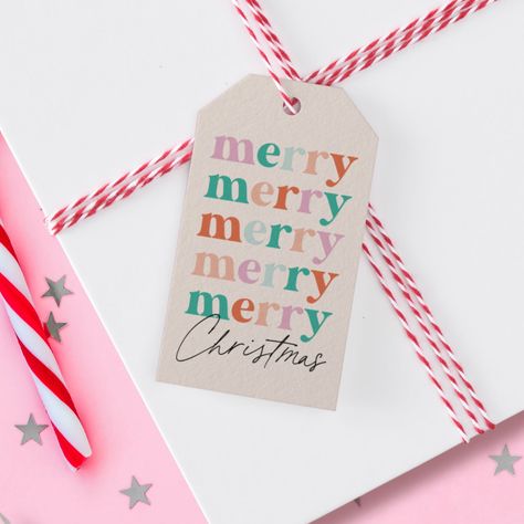 A modern, colorful and bright merry Christmas gift tag featuring the word "merry" written multiple times on top of each other in beautiful holiday colors. The word "Christmas' is written in a modern script.   The trendy typography will make this a popular choice. Christmas Tag Ideas, Happy Holidays Gift Tags, File Ideas, Trendy Typography, Christmas Gift Tags Handmade, Merry Christmas Tags, Merry Christmas Gift Tags, Xmas Tags, Gift Tag Design