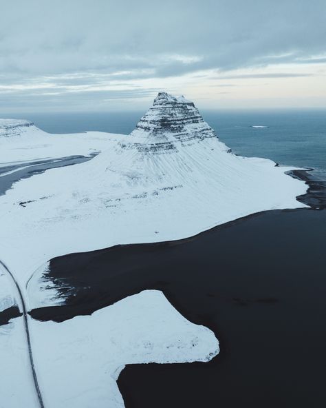 64°56'24"N 23°18'30"W Kirkjufell, a uniquely shaped peak on the North shore of Iceland's Snæfellsnes peninsula #iceland Snaefellsnes Peninsula, Liminal Spaces, Fire And Ice, Iconic Landmarks, North Shore, Iceland, Mount Everest, Tower, Natural Landmarks