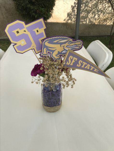 Centerpieces college Trunk Party Centerpiece Ideas, Signing Table Decor, Trunk Party Ideas College, Grad Party Centerpieces, Reunion Centerpieces, College Pennants, Trunk Party, Sports Banquet, College Event