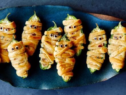 25 Best Halloween Potluck Ideas | Halloween Party Ideas and Recipes : Food Network | Food Network Halloween Potluck Recipes, Mummy Bandages, Halloween Dip, Halloween Potluck, Spooky Ideas, Chicken Pumpkin, Halloween Food Appetizers, Potluck Ideas, Halloween Foods