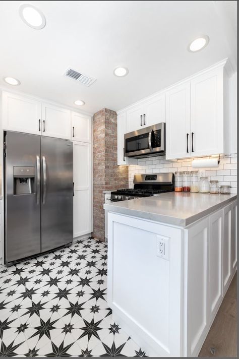 This cozy kitchen is the perfect blend of charm and character! 🍽️✨ The standout floor tiles add a pop of personality, while the exposed brick brings warmth and texture to the space. It's a stylish and comfortable haven that truly feels like the heart of the home. Ready to cook up some magic in a space like this?  #CozyKitchen #HomeInspiration #InteriorDesign #ExposedBrick #StylishSpaces Black And White Kitchen Tile, Black And White Kitchen Floor, White Kitchen Tile, Black And White Kitchen, White Kitchen Tiles, White Tile Floor, Cozy Kitchen, Kitchen Tile, Kitchen Inspo