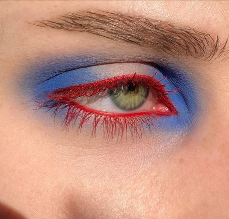 Blue Mascara Makeup Ideas, Graphic Eye Shadow, Blue Makeup Looks Halloween, Colorful Makeup For Blue Eyes, Blue Orange Eyeshadow, Blue And Orange Makeup Look, Primary Color Makeup, Statue Of Liberty Makeup, Blue And Red Eyeshadow Looks