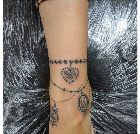 Bracelets With Flowers, Ankle Bracelet Tattoos, Charm Anklet Tattoo, Anklet Tattoos For Women, Ankle Band Tattoo, Charm Bracelet Tattoo, Tattoos Ankle, Wrap Around Wrist Tattoos, Bracelet Tattoos