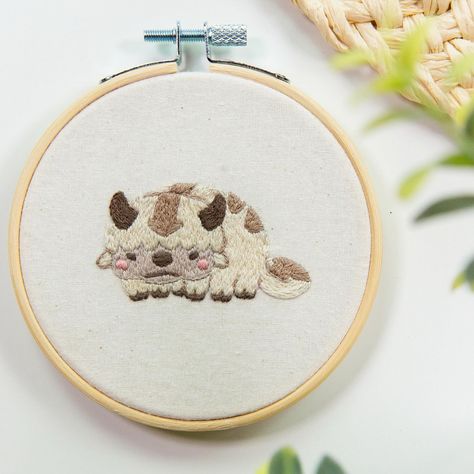 Bring your favorite sky bison to life with my newest Appa embroidery pattern! As someone who LOVES Avatar the Last Airbender, it was only a matter of time before I added some designs to my shop. Keep a lookout for more to come! #ATLA #ShopJamiePhoto #JamiePhotoDiy Appa Embroidery Pattern, Avatar The Last Airbender Nursery, Atla Embroidery, Avatar Embroidery, Appa Embroidery, Sky Bison, Matter Of Time, Nursery Inspo, More To Come