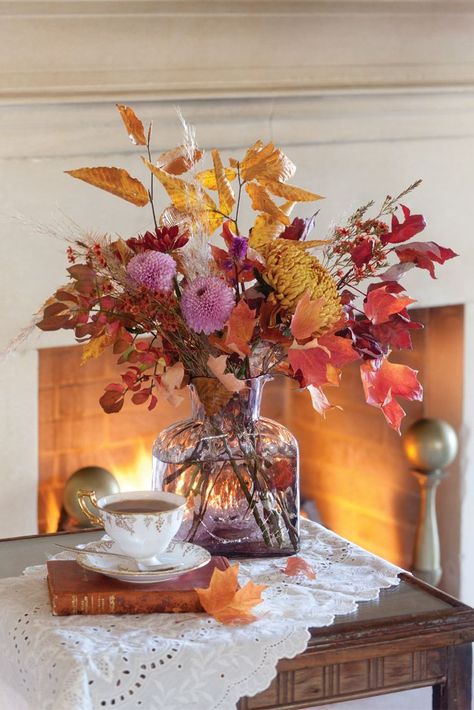 When the trees burst with vibrant leaves in an array of hues from gold to crimson, nature provides accents befitting the glory of the season. Our autumn arrangements, laden with colorful fruits and flowers, are destined to inspire. Fall Floral Centerpieces, Fall Centerpieces, Victoria Magazine, Autumn Tea, Fall Floral Arrangements, Deco Nature, Autumn Table, Fall Centerpiece, Arte Floral