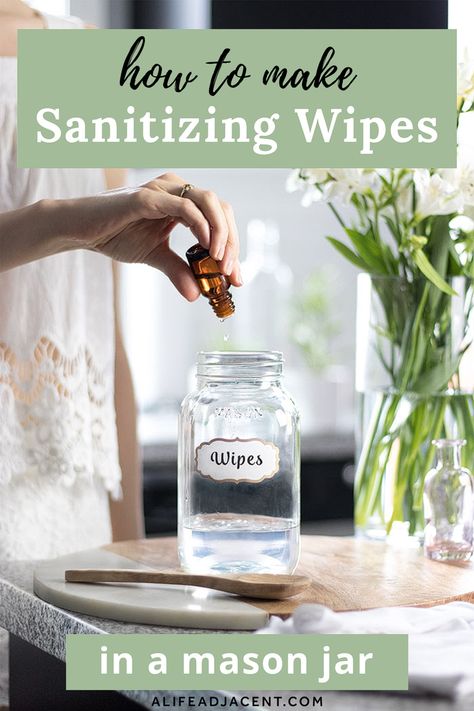 Clean up without chemicals – learn how to make your own DIY sanitizing wipes in a mason jar! These handy, reusable cleaning wipes are made with all natural ingredients: alcohol from high proof vodka, castile soap, and antibacterial essential oils such as thieves. You can cut your wipes from an old t-shirt or simply use reusable cloths. Keep your wipes in a mason jar or another eco-friendly container for easy access and zero waste! #alifeadjacent #cleaning #diycleaningproducts Diy Disinfecting Wipes, Reusable Cleaning Wipes, Homemade Disinfecting Wipes, Antibacterial Essential Oils, Homemade Cleaners Recipes, Natural Cleaning Recipes, Antibacterial Wipes, Diy Cleaning Products Recipes, Reusable Wipes