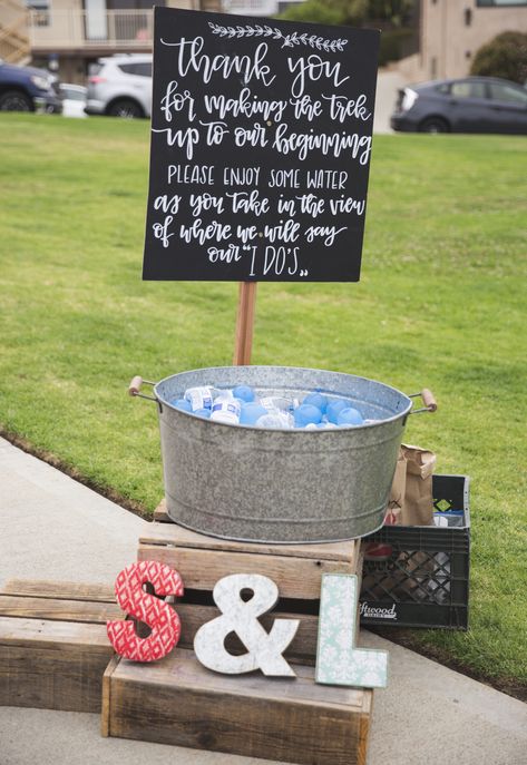 Wedding Water Bottle Station, Water Trough Cooler Wedding, Wedding Beverage Sign, Wedding Beverage Stations, Wedding Water Station, Frozen Water Balloons, Park Ceremony, Water Pail, Park Wedding Ceremony