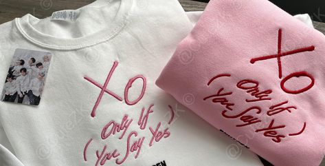 Enhypen Inspired XO   PCs are NOT INCLUDED  Embroidered by CuteZK and we offer this in sizes small through 3x (if you need a smaller or larger size don't hesitate to get in touch with me.  Pricing will be higher and I can set up a custom listing for you.  I am offering this in four colors  White, Cream, Pink, and black, and either in pink lettering or Red lettering.  I primarily use Jerzees nublend brand and I also use Gildan. I will use whatever I have in stock at the time of your order. If you Enhypen Xo Shirt, Enhypen Hoodie, Enhypen Merch, Embroidery Hoodie, Pink Posters, Cute Embroidery, Easy Trendy Outfits, Embroidered Sweatshirt, Really Cute Outfits