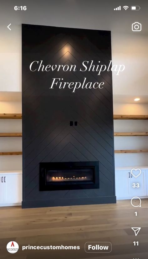 Black Accent Fireplace, Fireplace Makeover Tall Ceiling, Black Chevron Fireplace, Chevron Shiplap Fireplace Wall, Fireplace Black Herringbone Tile, Panelled Fireplace, Black Shiplap Fireplace With Wood Mantle, Chevron Fireplace Wall Black, Black Wash Brick Fireplac With Tv On Tope