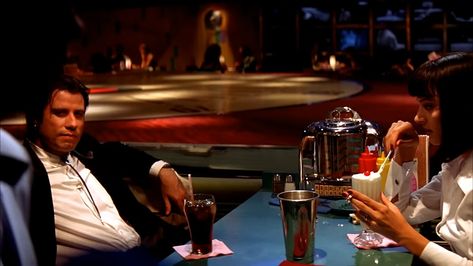 In the movie "Pulp Fiction," what is the $5 shake that Vincent Vega (John Travolta) and Mia Wallace (Uma Thurman) go to Jackrabbit Slim's to drink? #PulpFiction #QuentinTarantino #JohnTravolta #UmaThurman #SamuelLJackson #VincentVega #MiaWallace #JulesWinnfield #TheGimp #RoyaleWithCheese #ButchCoolidge #MarsellusWallace #Hitmen #CultClassic #IndieFilm #90sMovies #TarantinoUniverse #NonLinear #DarkComedy #CinemaLovers #MovieMemories #FilmGeek #QuentinTarantinoFans Vincent Vega Pulp Fiction, Pulp Fiction Diner, Vincent Vega, Quentin Tarantino Films, Tarantino Films, Personal Investigation, 90s Movies, Jack Rabbit, Uma Thurman