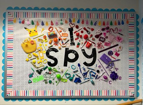 I used a mix of hot glue and staples to put together my I Spy interactive bulletin board. This will be a great incentive for students to play while lining up or before leaving speech therapy. I Spy Bulletin Board Preschool, Wheres Waldo Bulletin Board, Sensory Room Display Board, Ispy Bulletin Board Ideas, I Spy Board, Special Ed Bulletin Boards, Aba Bulletin Board Ideas, Bulletin Board For Special Education, Welcome To Speech Therapy Bulletin Board