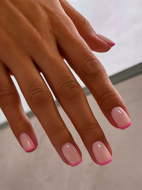 Classic yet contemporary, these nail inspo ideas pink bring a fresh take on the French tip. A soft, semi-transparent pink base sets the stage for ultra-thin neon pink tips, creating a subtle contrast that feels effortlessly chic. This design works beautifully on nail inspo ideas short, making it ideal for those who love a polished look without the hassle of long nails. Pink French Tips, Nail Inspo Ideas, Pink Tips, Hottest Nail Trends, Nails 2025, Soft Watercolor, Pink French, Hot Nails, French Tips