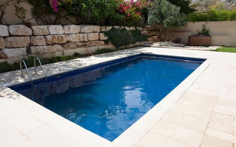 Are inexpensive inground pools just a myth? Not necessarily. Here are 5 tips on getting a swimming pool that’s both awesome and affordable. Cheap Inground Pool, Inground Pool Pricing, Homemade Swimming Pools, Small Inground Pool, Kleiner Pool Design, Inground Pool Designs, Pools For Small Yards, Pool Cost, Cheap Pool